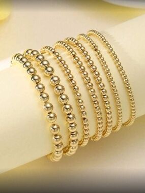 Set with 7 New Golden Bracelets - Luxury and Elegance